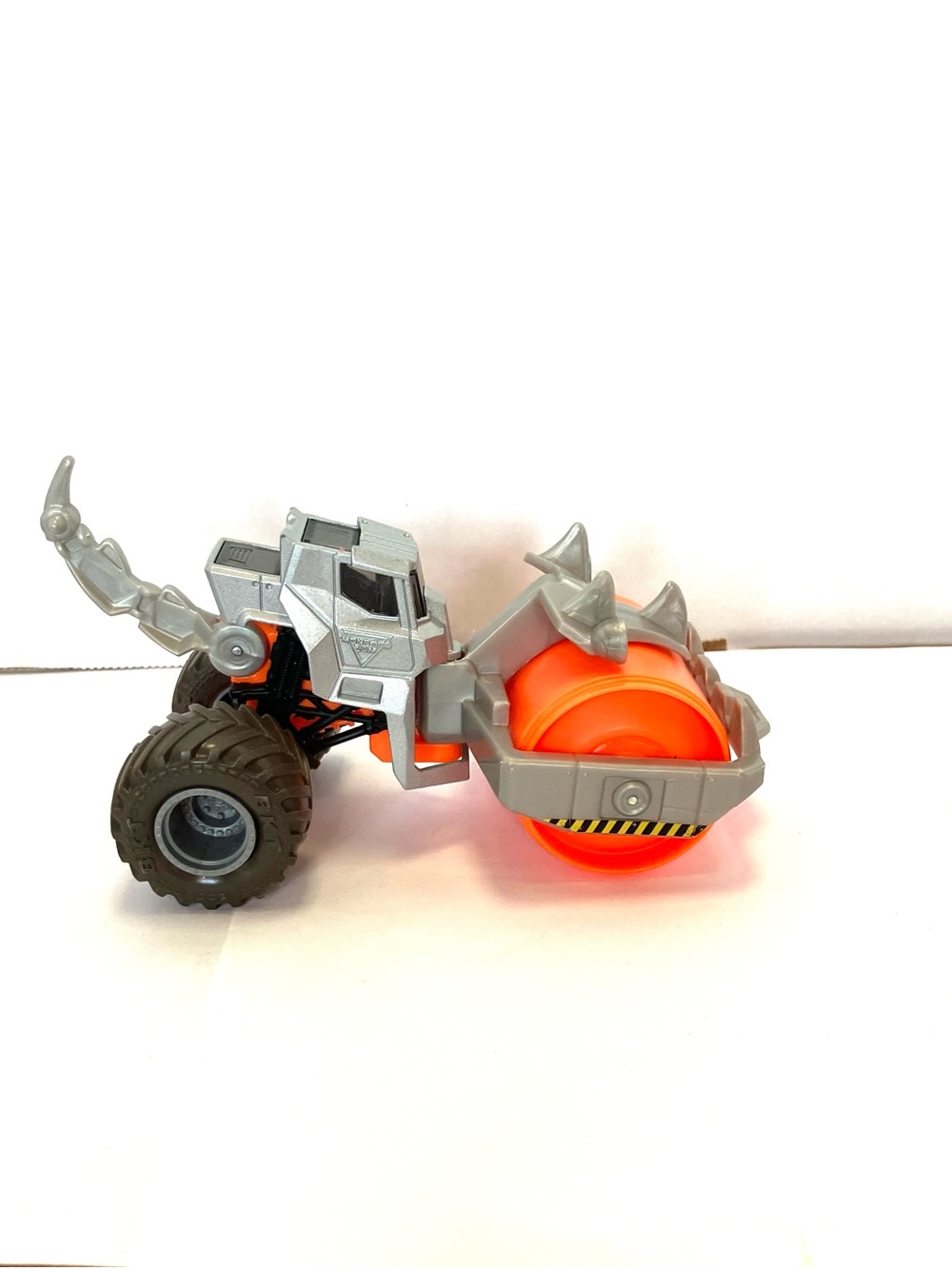 Monster Jam Dirt Squad Rolland Die Cast Vehicle 1:64 Gray BKT Tires